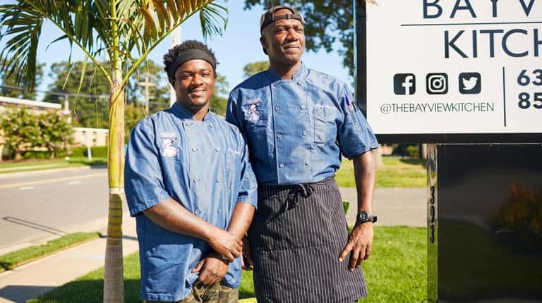 Co-chef Asim Henry and chef-owner Antoine Reid at Bayview Kitchen...