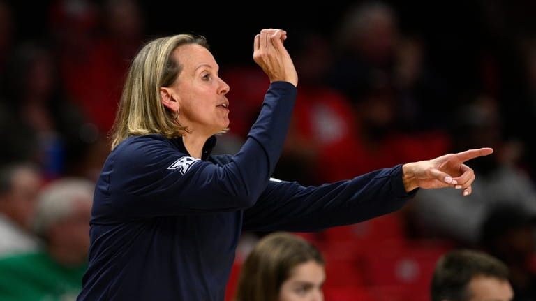 West Virginia head coach Dawn Plitzuweit gestures in the second...