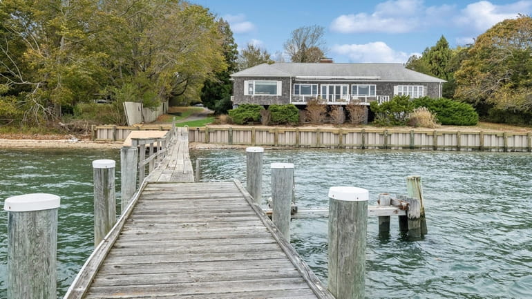 This Shelter Island home on Smith Cove is on the...