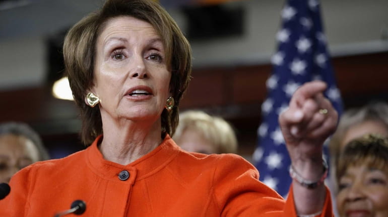 In this file photo, House Minority Leader Nancy Pelosi of...