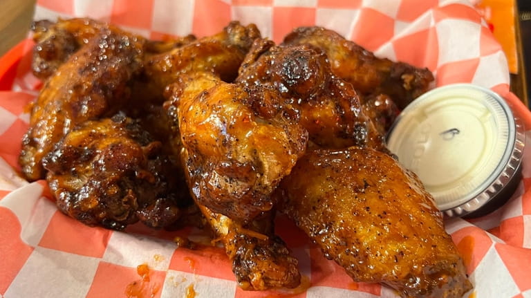 Wings with Coop BBQ sauce at The Coop in Farmingdale.