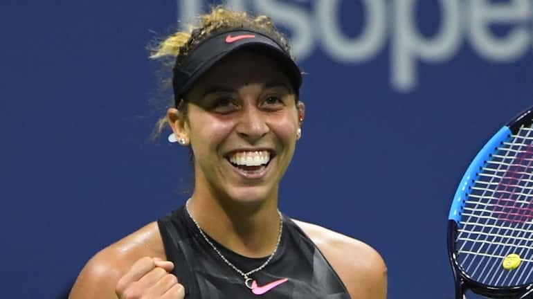 Madison Keys reacts after she defeats Kaia Kanepi in a...