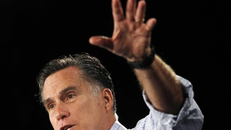 Republican presidential candidate, former Massachusetts Gov. Mitt Romney campaigns in...