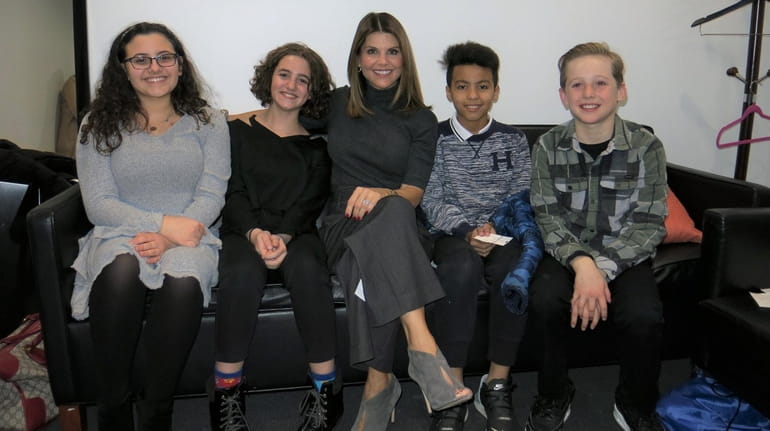 Actress Lori Loughlin, center, with Kidsday reporters, from left,  Emma...