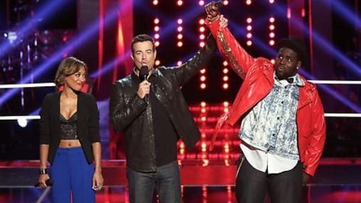 Amanda Brown watches "The Voice" host Carson Daly name Trevin...