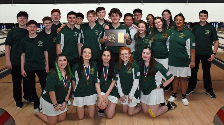 The Longwood boys and girls bowling teams celebrate their wins...