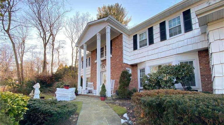 Priced at $1,150,000, this five-bedroom, 4½-bathroom Colonial on Stepping Stone...