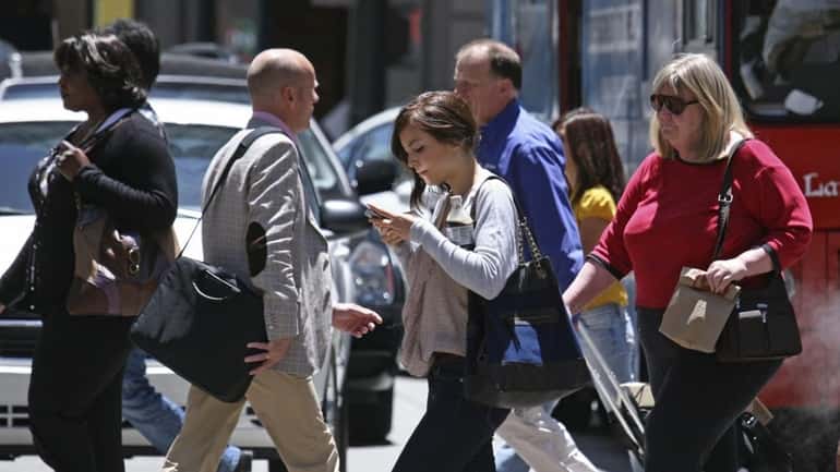 Experts say pedestrians are suffering the consequences of mobile distraction...