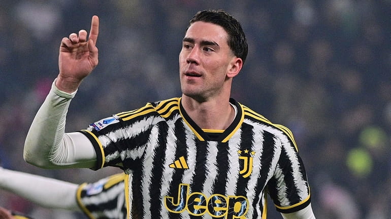 Juventus Turin's Dusan Vlahovic celebrates after scoring the opening goal...