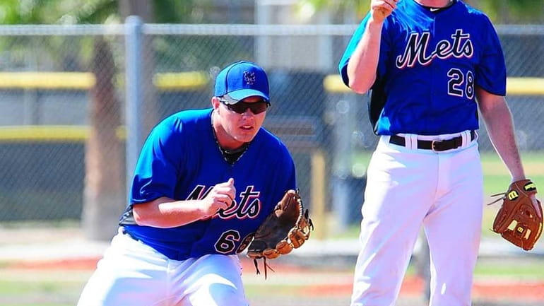 Brad Emaus and Daniel Murphy during a spring training workout...