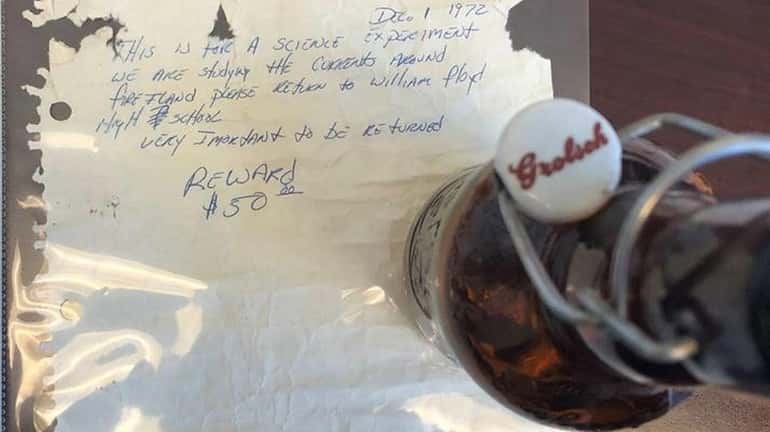 This bottle, with the handwritten note inside, recently was discovered on...