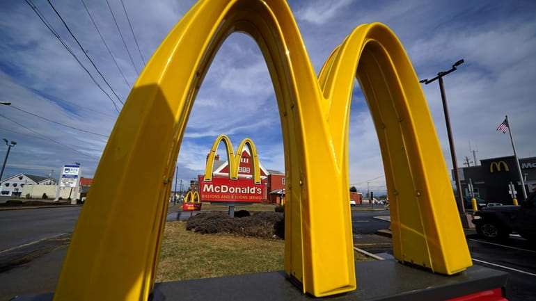 McDonald's restaurant signs are shown in in East Palestine, Ohio,...