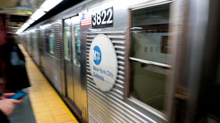 The C train pulls into the 34th Street-Penn Station subway...