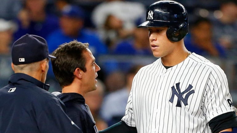 Yankees rookie Aaron Judge is checked out during his fourth...