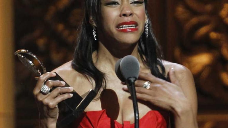 Nikki M. James accepts the Tony Award for best performance...