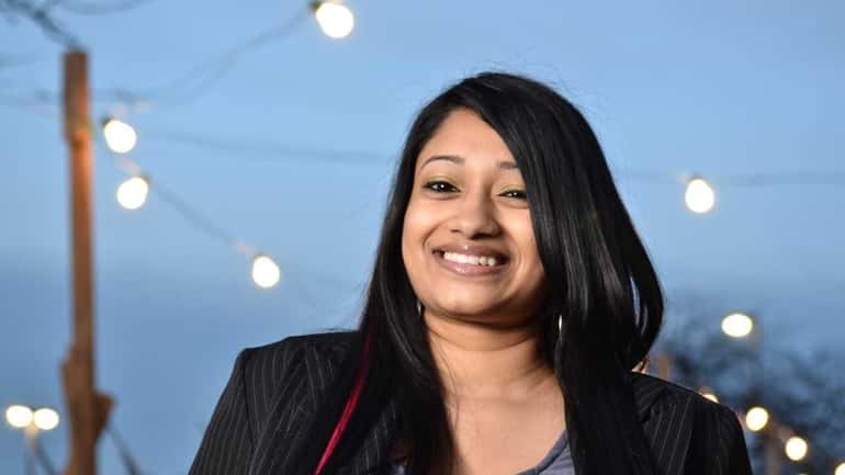 Malisa Ali, a graduate of Stony Brook University, poses for...