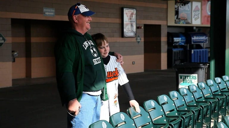 Charlie Kramer and his 11-year-old son Ryan are the first...