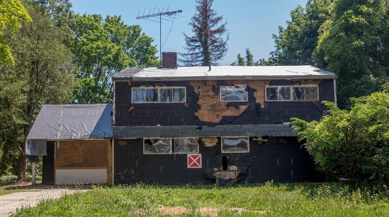 "Zombie" homes, like this one in Wantagh seen on June...