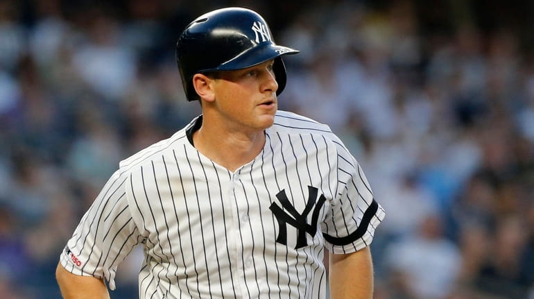 DJ LeMahieu of the Yankees singles during the third inning...