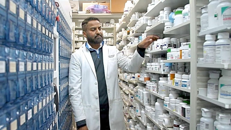 Pharmacist Nidhin Mohan, at the New Island Pharmacy in Deer...