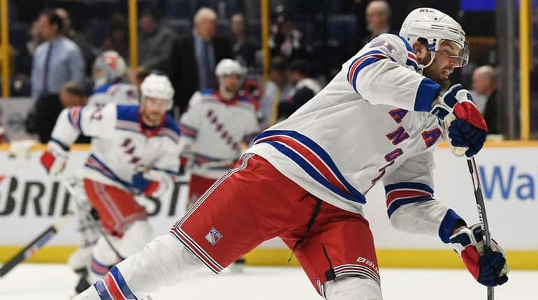 Rangers right wing Rick Nash warms up before a game...