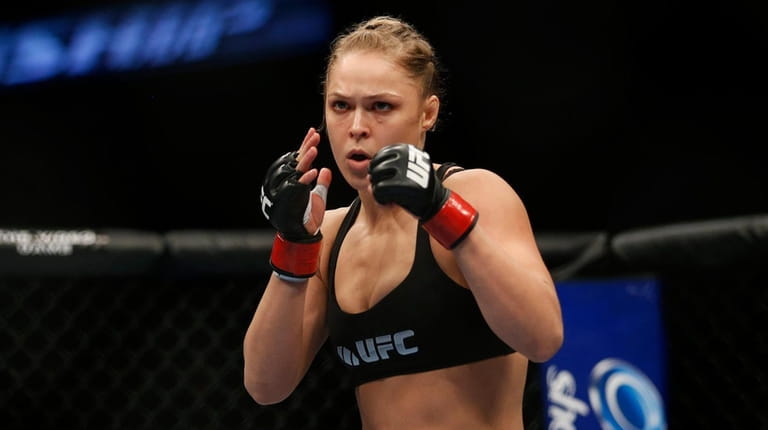 Ronda Rousey readies for the first female MMA fight in...