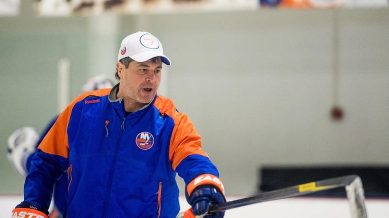 New York Islanders head coach Jack Capuano during practice at...