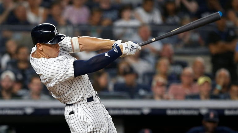 Aaron Judge  homers in the seventh inning against the Boston...