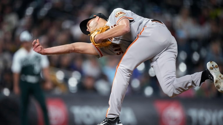 San Francisco Giants relief pitcher Tyler Rogers works against the...