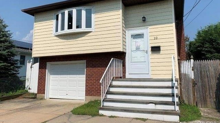 Priced at $384,900 and located on Madison Drive in Lindenhurst, this...