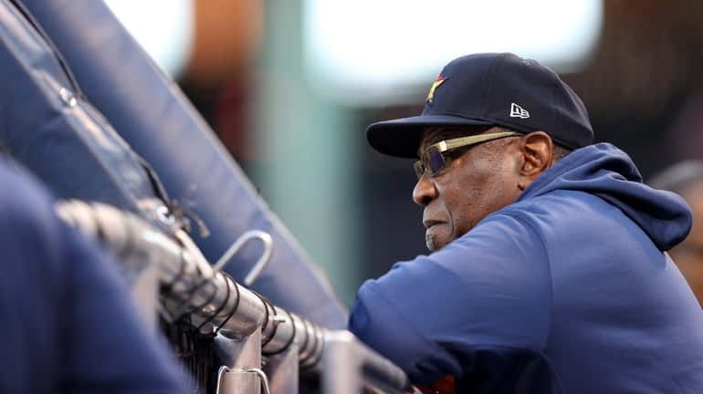 Manager Dusty Baker of the Houston Astros stands on the...