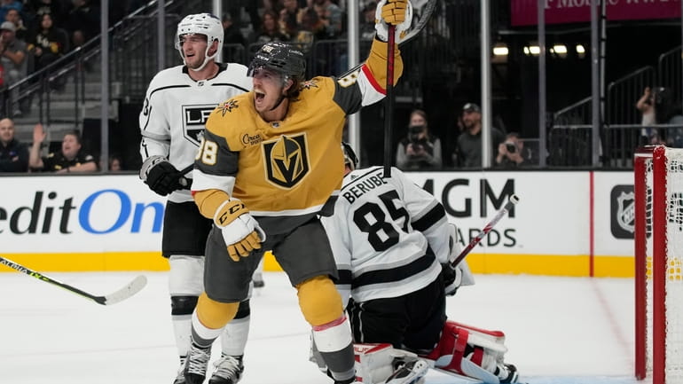 Vegas Golden Knights' Maxime Comtois celebrates after his team scored...