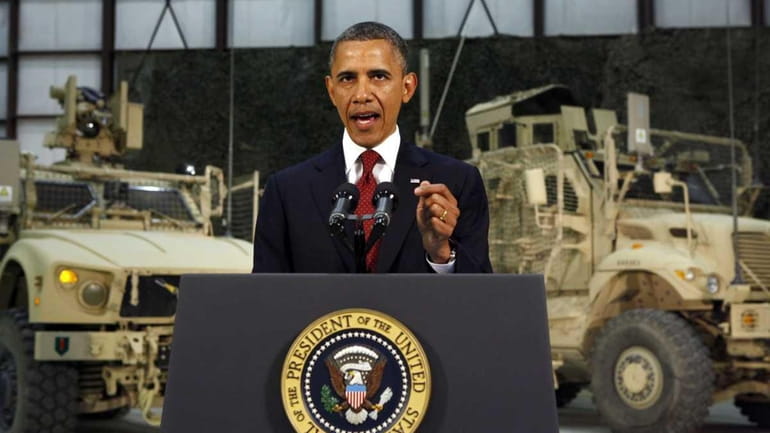 President Barack Obama delivers a speech from Bagram Air Base,...
