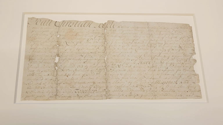 A deed dated Aug. 1, 1701, records the transfer of...