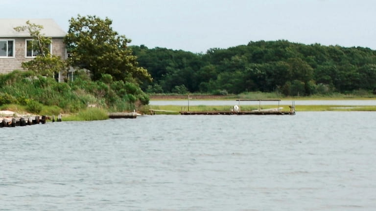 Rising tides could turn Southold's Hashamomuck Pond, seen in 2006,...