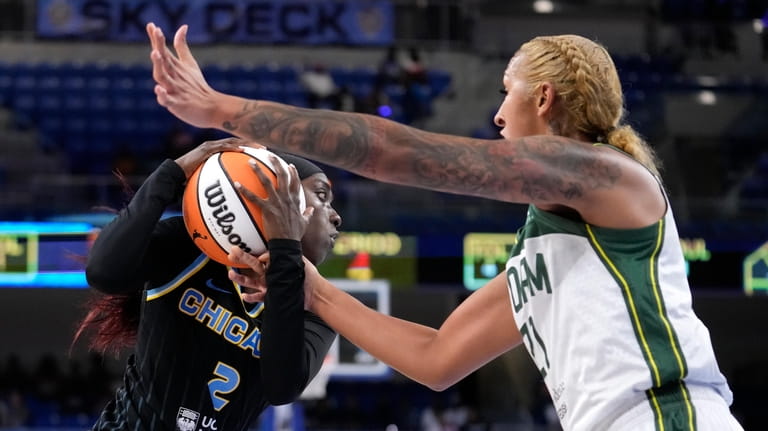 Chicago Sky's Kahleah Copper drives to the basket as Seattle...