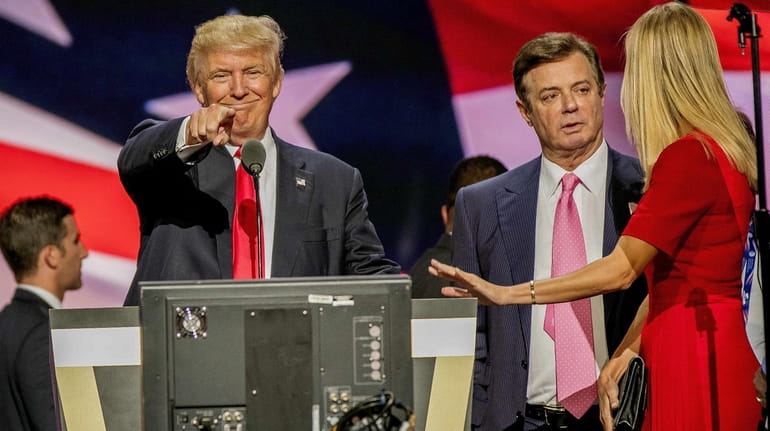Donald Trump's former presidential campaign manager, Paul Manafort, with President...