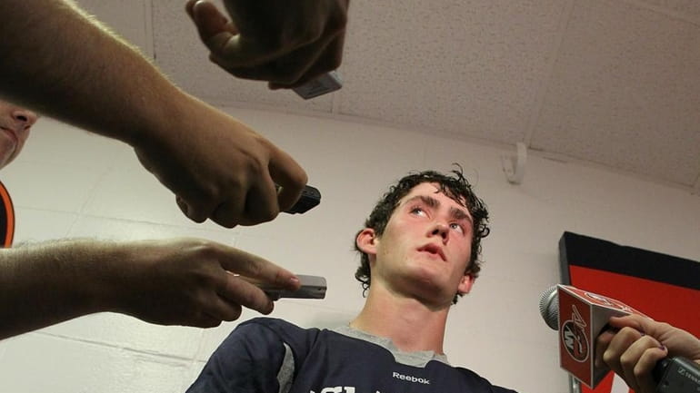 Brock Nelson is interviewed by the media during the New...