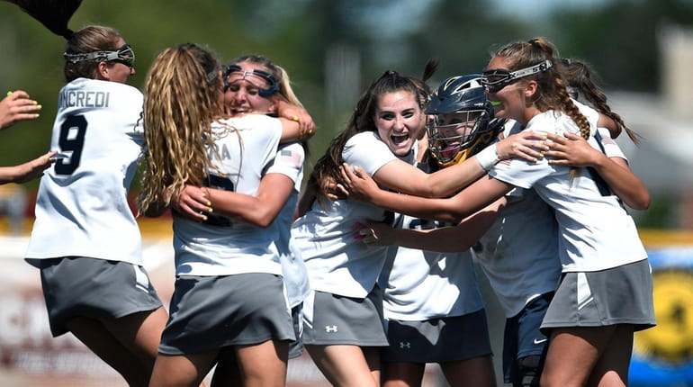 Eastport-South Manor players after the final whistle of the state...