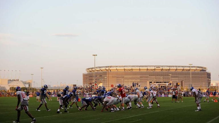Members of the New York Giants take part in practice...