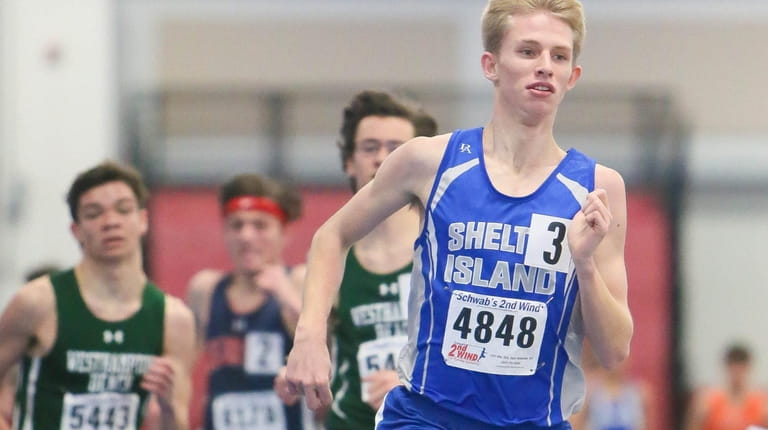 Shelter Island's Kal Lewis wins the 1,600-meter run during the...
