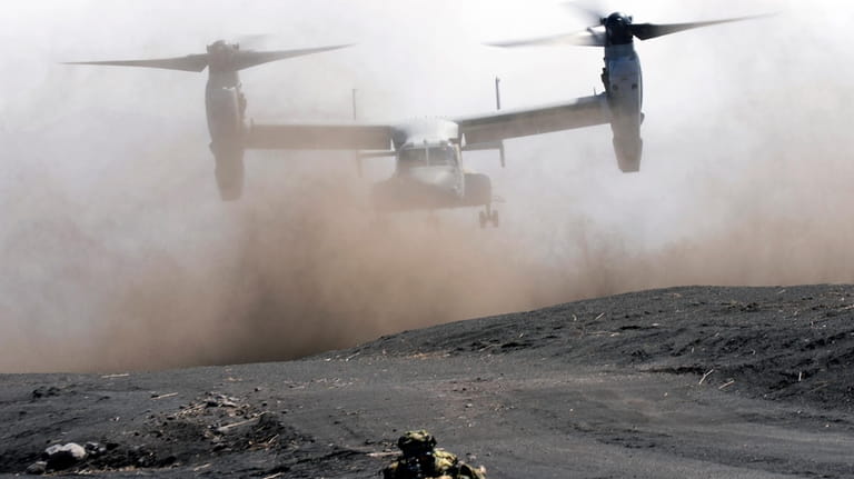 An MV-22 Osprey takes off as Japan Ground Self-Defense Force...