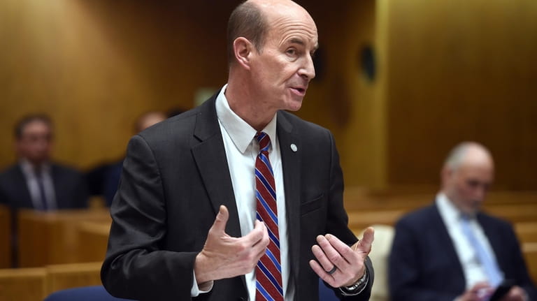 State's Attorney John Doyle speaks during a hearing for four...