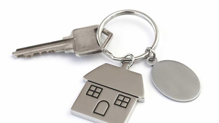 House shaped keychain with keys  for Home Real Estate section