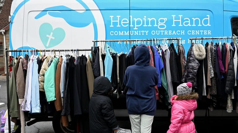 Helping Hand Rescue Mission runs a community closet that offers...
