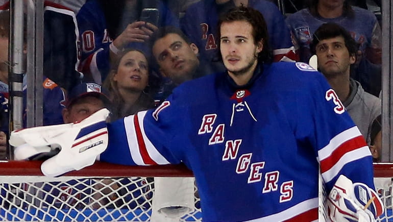 Igor Shesterkin of the Rangers looks on during the third period...