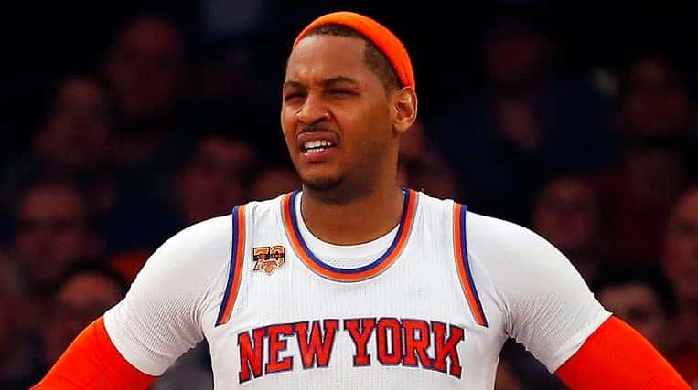 The Knicks' Carmelo reacts in the fourth quarter against the...