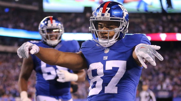 Giants wide receiver Sterling Shepard celebrates after scoring a touchdown...