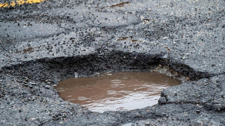 Half of a pothole on Middle Neck Road in Great...