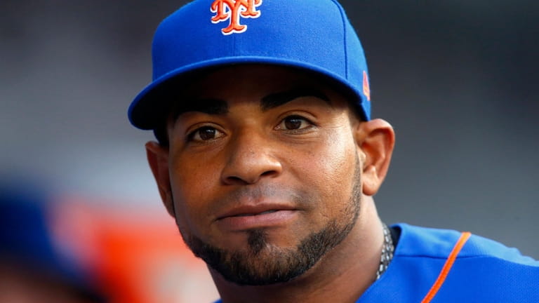 Yoenis Cespedes of the Mets looks on before a game against...
